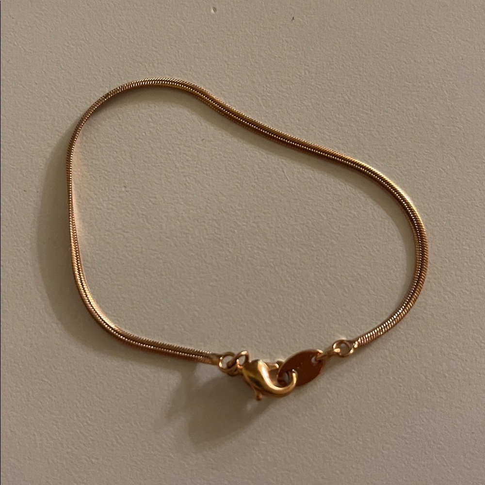 S. H gold tone metal bracelet - Picture 2 of 3